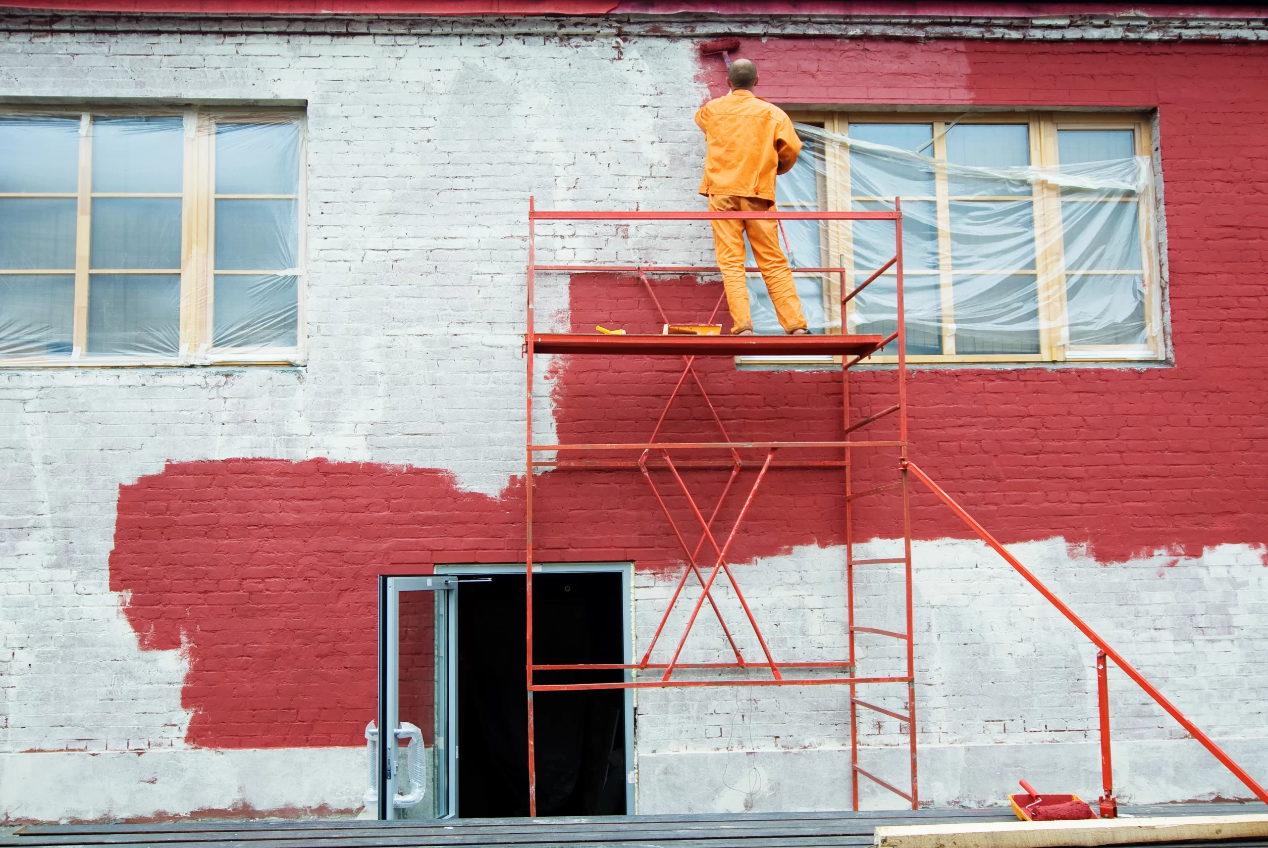 External painting on a red brick wall