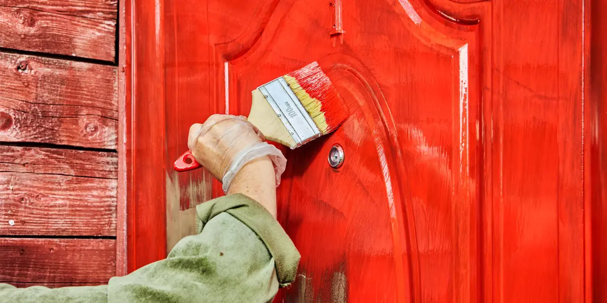 this picture shows Painting door frames